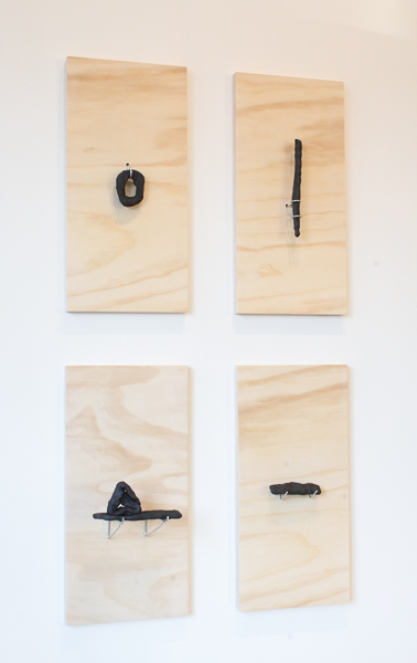 Cassius by Ebitenyefa Baralaye, stoneware, wood, pegboard hooks